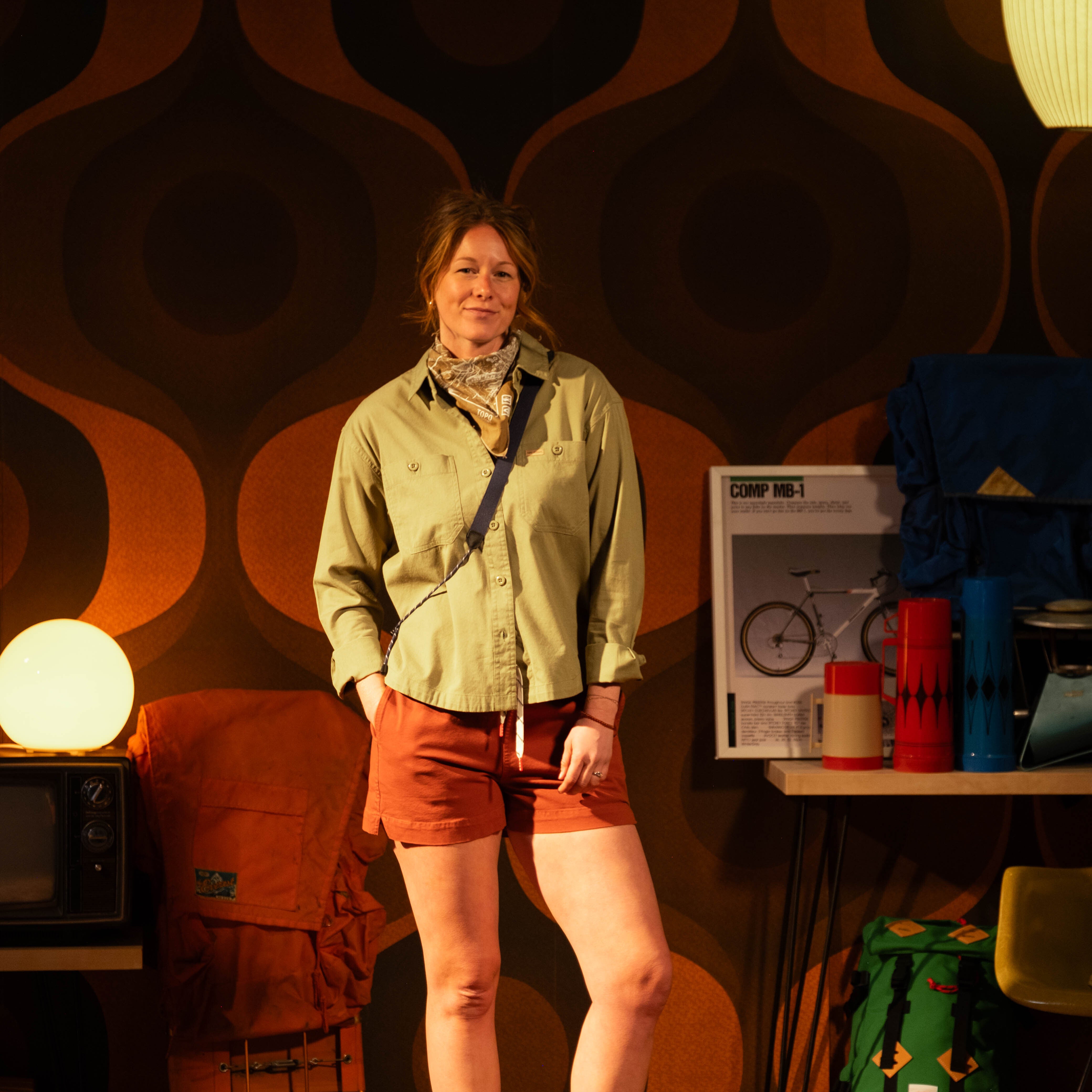 General image of female model in studio wearing Topo Designs Daytripper Shirt Long Sleeve - Women's [Model is 5'10", wearing size medium]