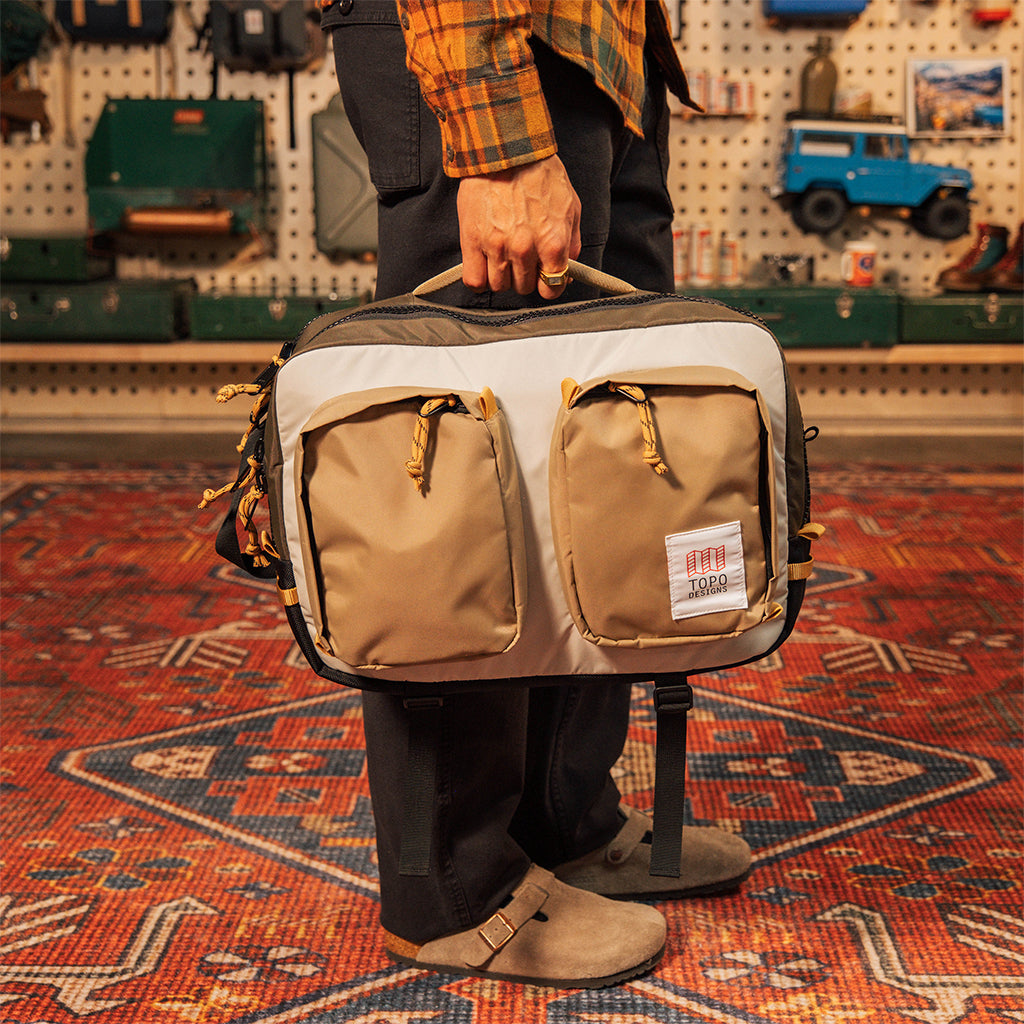 General shot of Global Briefcase being carried by side handle
