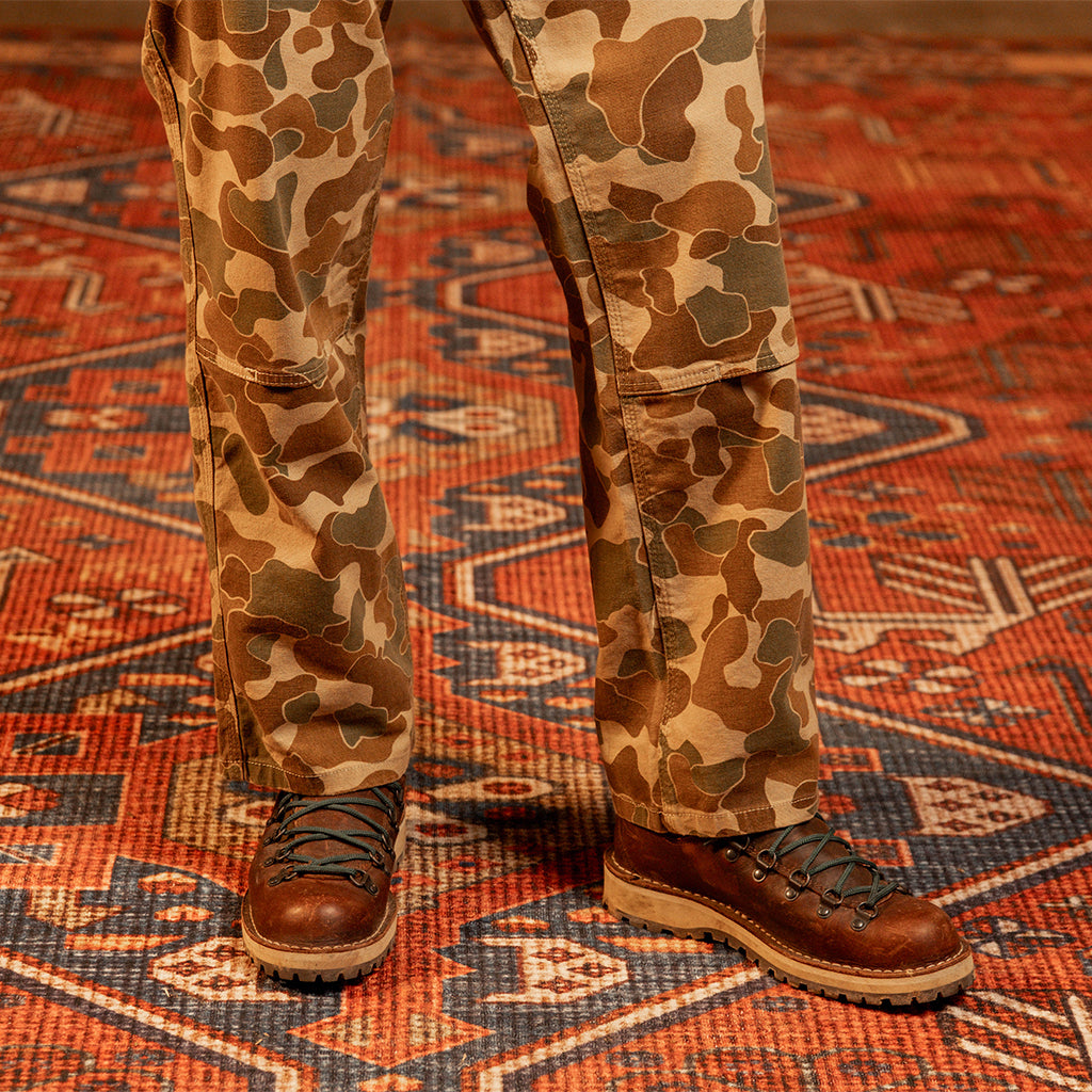 Detail image of a man wearing "Duck Camo" Utility Pants [Model is 5'11", wearing size 32]