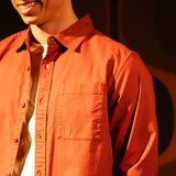 General model shot of Topo Designs Desert Shirt - Men's in "Terracotta" [Model is 5'11", wearing size medium]