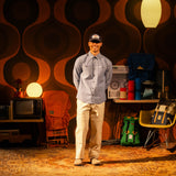 General lookbook photo of model wearing Topo Designs Utility Shirt - Men's in "Blue Chambray" [Model is 5'11", wearing size medium]