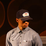 General lookbook photo of model wearing Topo Designs Utility Shirt - Men's in "Blue Chambray" [Model is 5'11", wearing size medium]