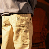 General model shot of Topo Designs Utility Pants Undyed - Men's in "Undyed" [Model is 5'10', wearing size 32]