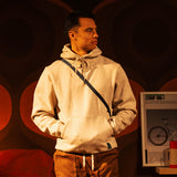 General image of Alpine High Label Hoodie in "Oatmeal Heather" [Model is 5'11", wearing size medium]