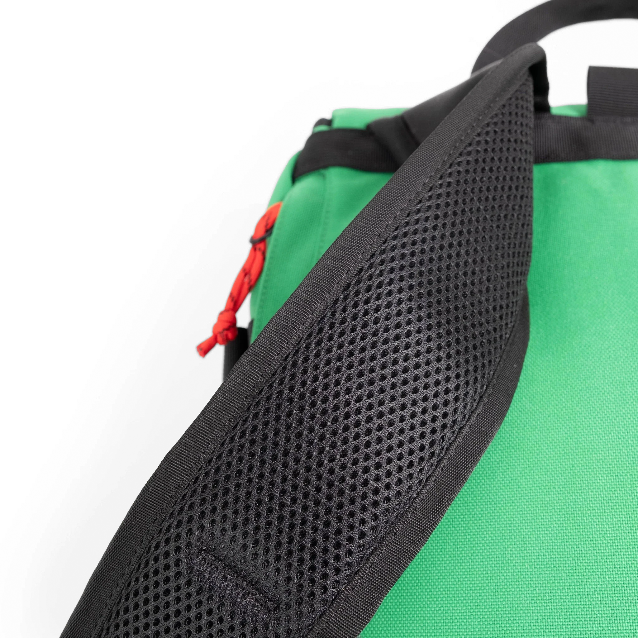General detail image of padded straps on the back of the Topo Designs Klettersack Classic vintage-inspired rucksack backpack in "Alpine Meadow".