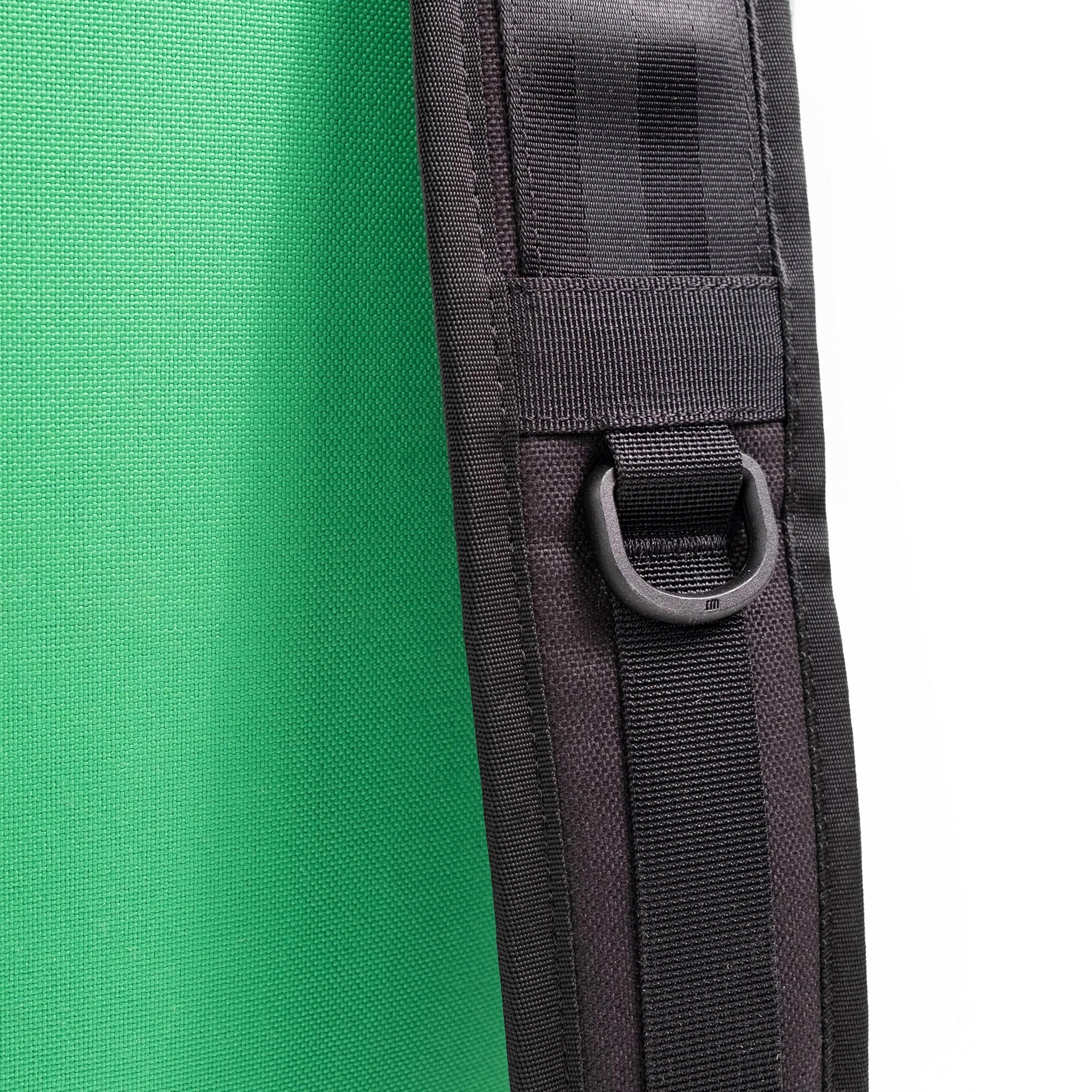 General detail image of  strap hooks on the straps on the back of the Topo Designs Klettersack Classic vintage-inspired rucksack backpack in "Alpine Meadow".