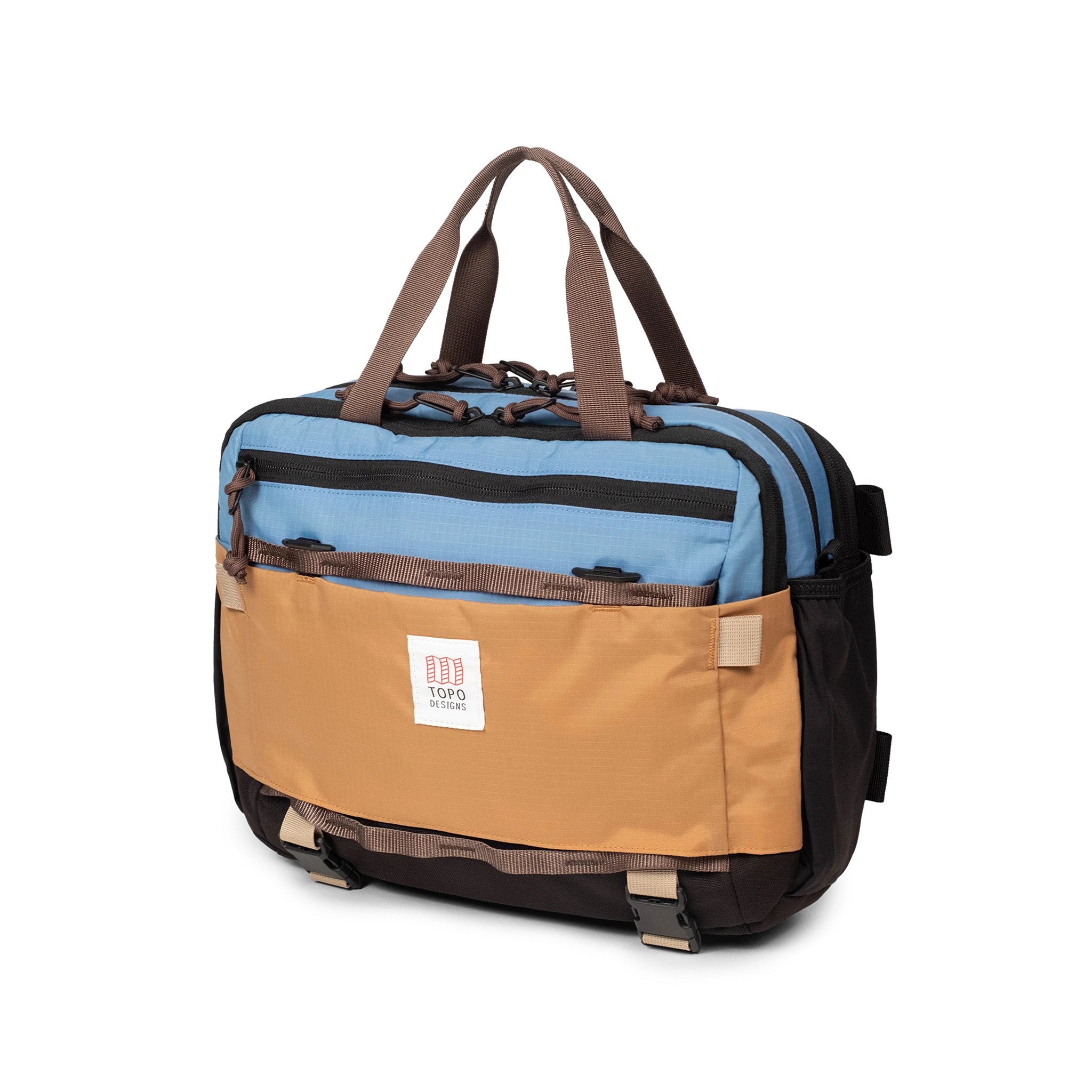 Quarter View of Topo Designs Mountain Cross Bag in "River Blue / Brown Oak"