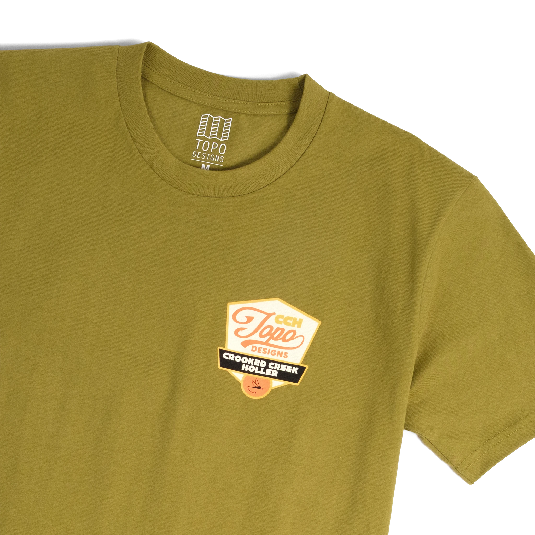Front detail shot of Topo Designs x CCH x Pine Printshop Golden Trout Tee in "Moss"