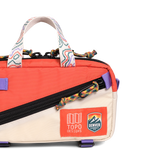 Front detail shot of Topo Designs x Denver Summit Mini Quick Pack in "Sandstone / Bone White"