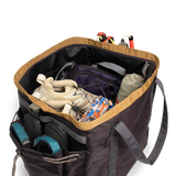 General Detail shot of Topo Designs Mountain Gear Bag packed out in "Black / Neutral".