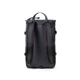 Back View of Topo Designs Rover Pack Mini in "Black Grid"