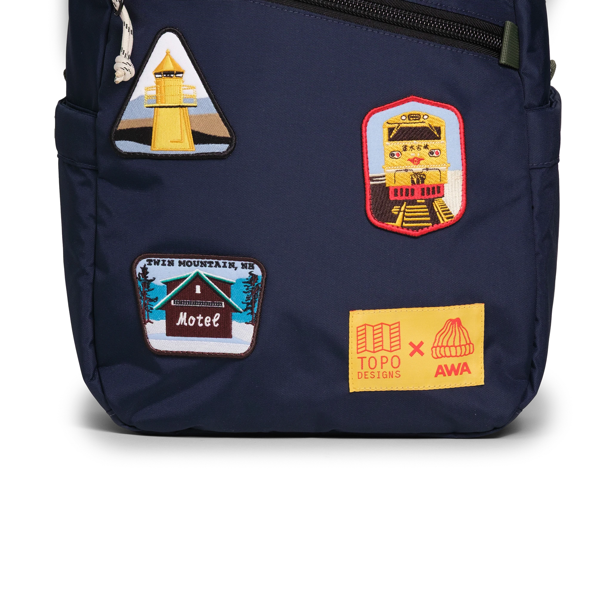Front exterior detail image of the Topo Designs x AWA Light Pack in "Navy / Navy"