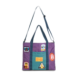 Front image of Topo Designs x AWA Mountain Essential Tote in "Loganberry / Caribbean" with shoulder strap extended