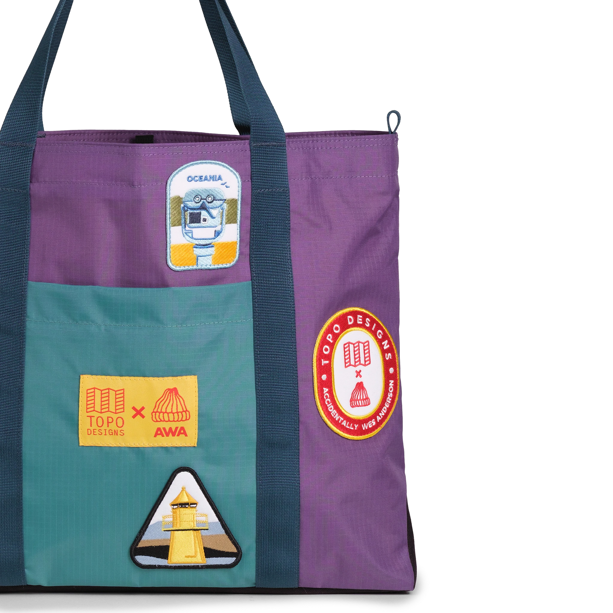 Front exterior detail image of Topo Designs x AWA Mountain Essential Tote in "Loganberry / Caribbean"
