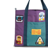 Front exterior detail image of Topo Designs x AWA Mountain Essential Tote in "Loganberry / Caribbean"