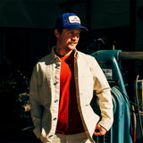 General lifestyle image of Patch Mesh Trucker - Retro Icon hat in "French Blue"